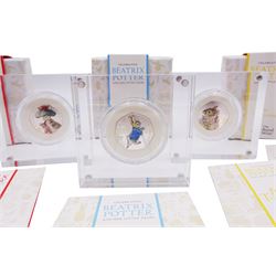 Three The Royal Mint United Kingdom Beatrix Potter silver proof fifty pence coins, 'Benjamin Bunny', 'Mrs Tittlemouse' and 'Peter Rabbit' all cased with certificates