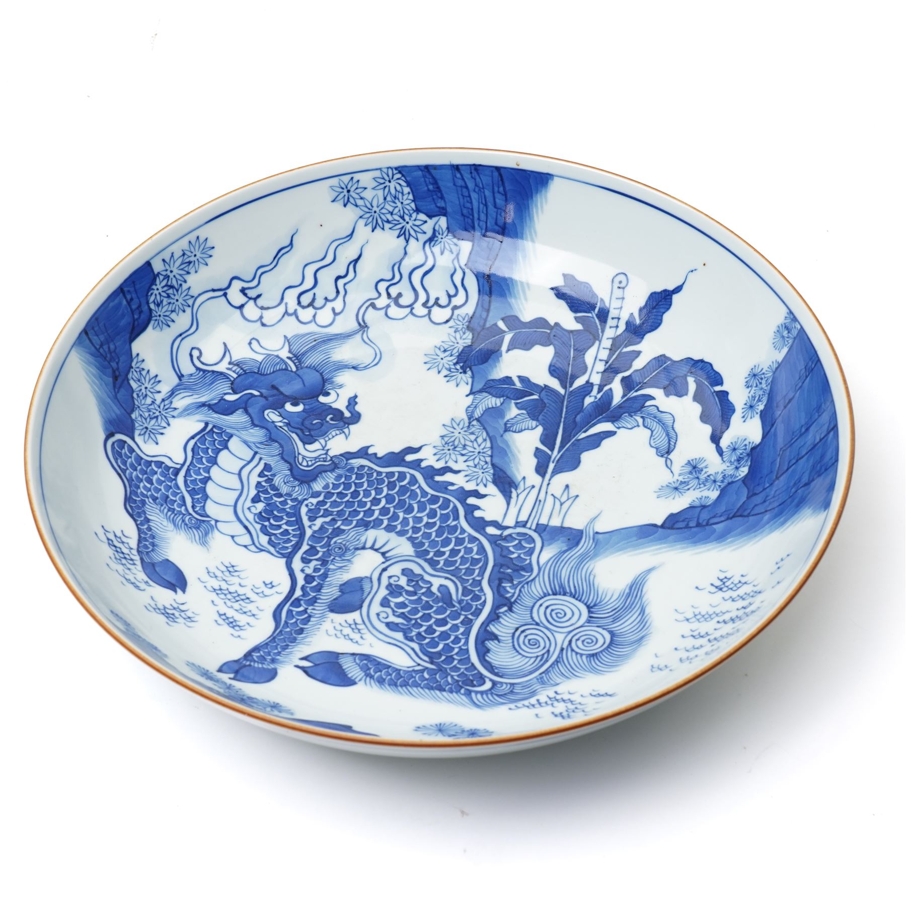 17th century Chinese blue and white charger, decorated centrally with a Qilin, four character mark within double blue ring to base, D34cm