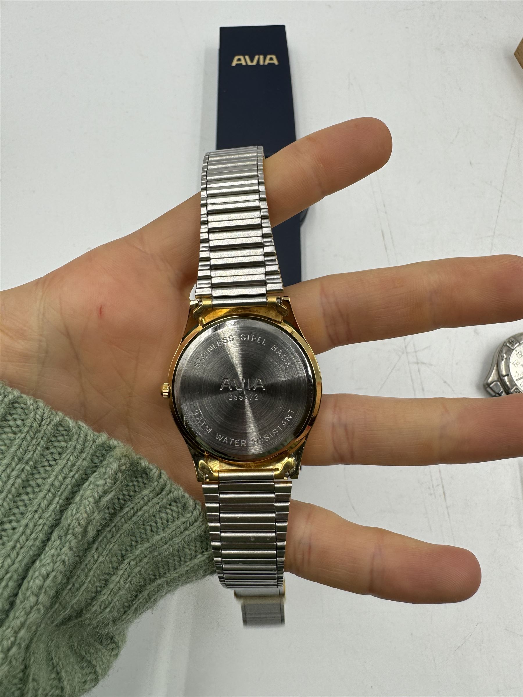 Six gentleman's wristwatches, including Avia, La Carre and Le Chat examples, together with a Smiths shockproof stop watch and a Sekonda stop watch, and a collection of spare watch straps