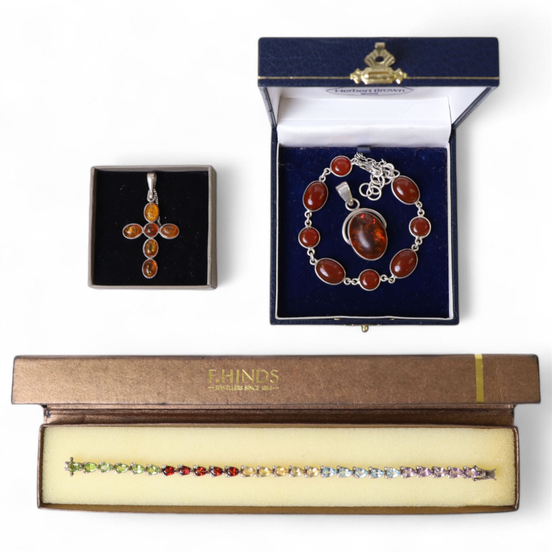 Silver stone set bracelet, silver Baltic amber cross pendant, silver amber bracelet and one other silver pendant