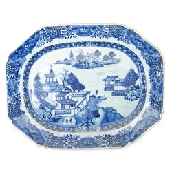  18th century Chinese export platter decorated in blue and white with a river landscape W40cm and two other Chinese export platters (3)