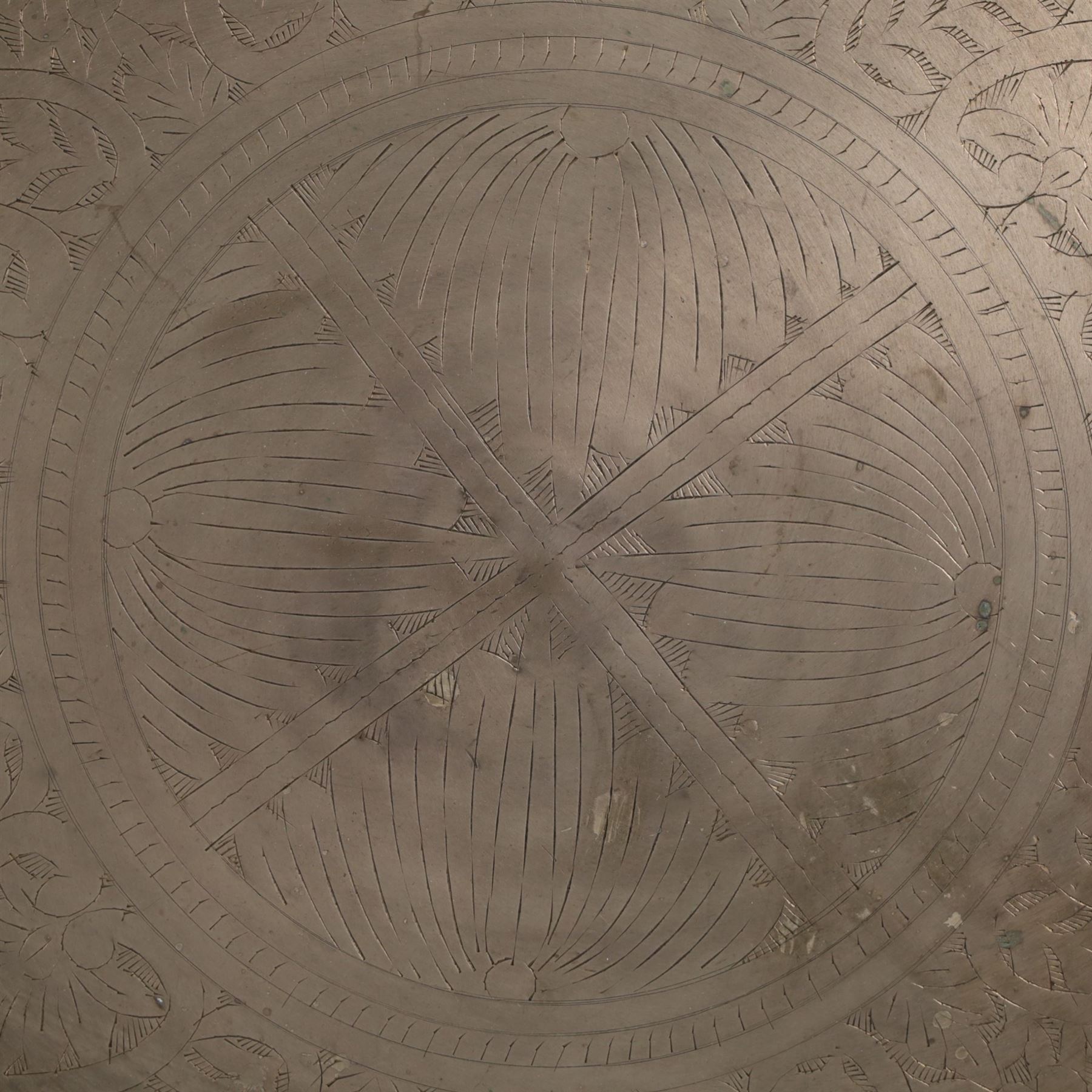 Large Eastern brass charger with floral and foliate engraved decoration, D70cm