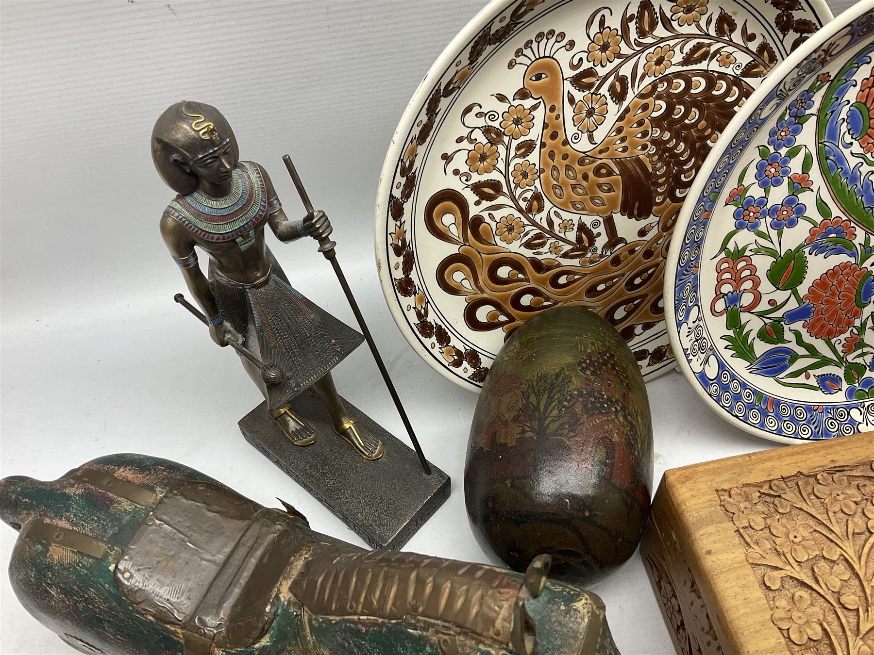 Two Greek Kerameikos plates together with a Kepamik plate and other Grecian style ceramics, carved African figures and treen, boxes etc 