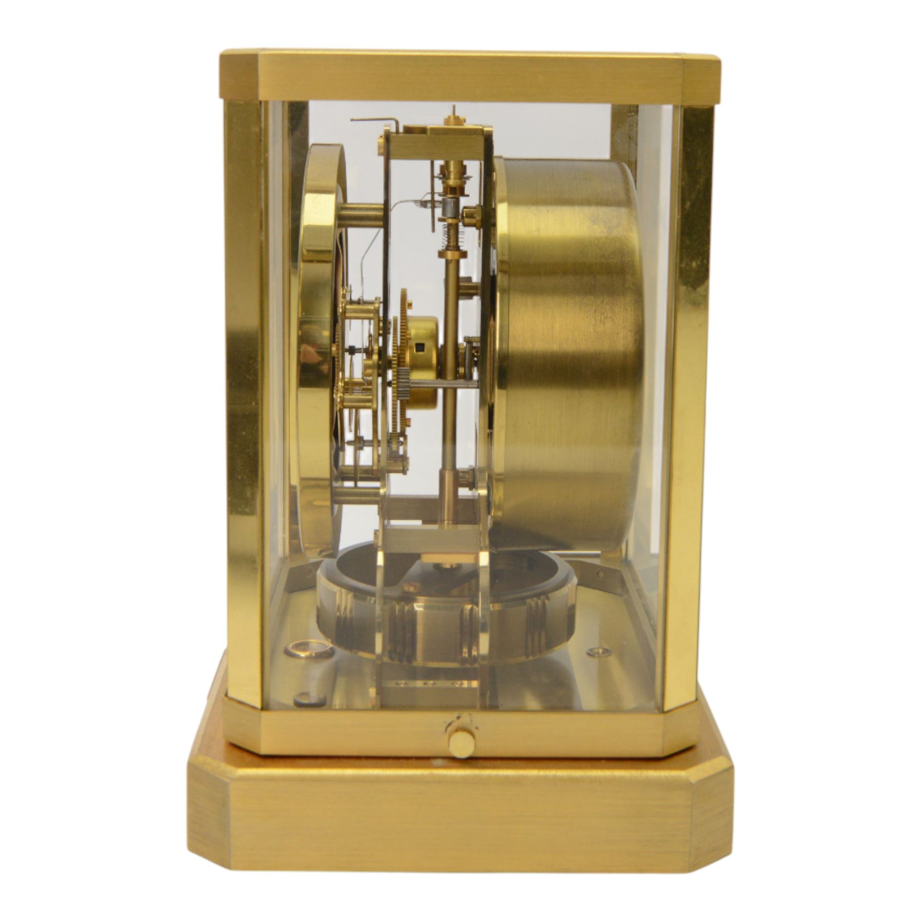 Jaeger-LeCoultre Atmos Clock - Caliber 528-6, 
gold-plated brass with glass panels, 15 jewel movement with atmospheric bellows winding motor, serial number 161881, circa 1960s, with engraved presentation plaque for W.W. Clayton, Canton Golf Club, 1964, in maker's box with instruction booklet, minute hand detached, H23.5xW21xD16cm