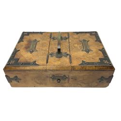 Early 20th century walnut brass bound smoking box, with central carry handle and twin hinged compartments with plaques detailed 'Cigarettes' and 'Cigars', above two small drawers detailed 'Lights', not including handle H7cm L24cm D16cm