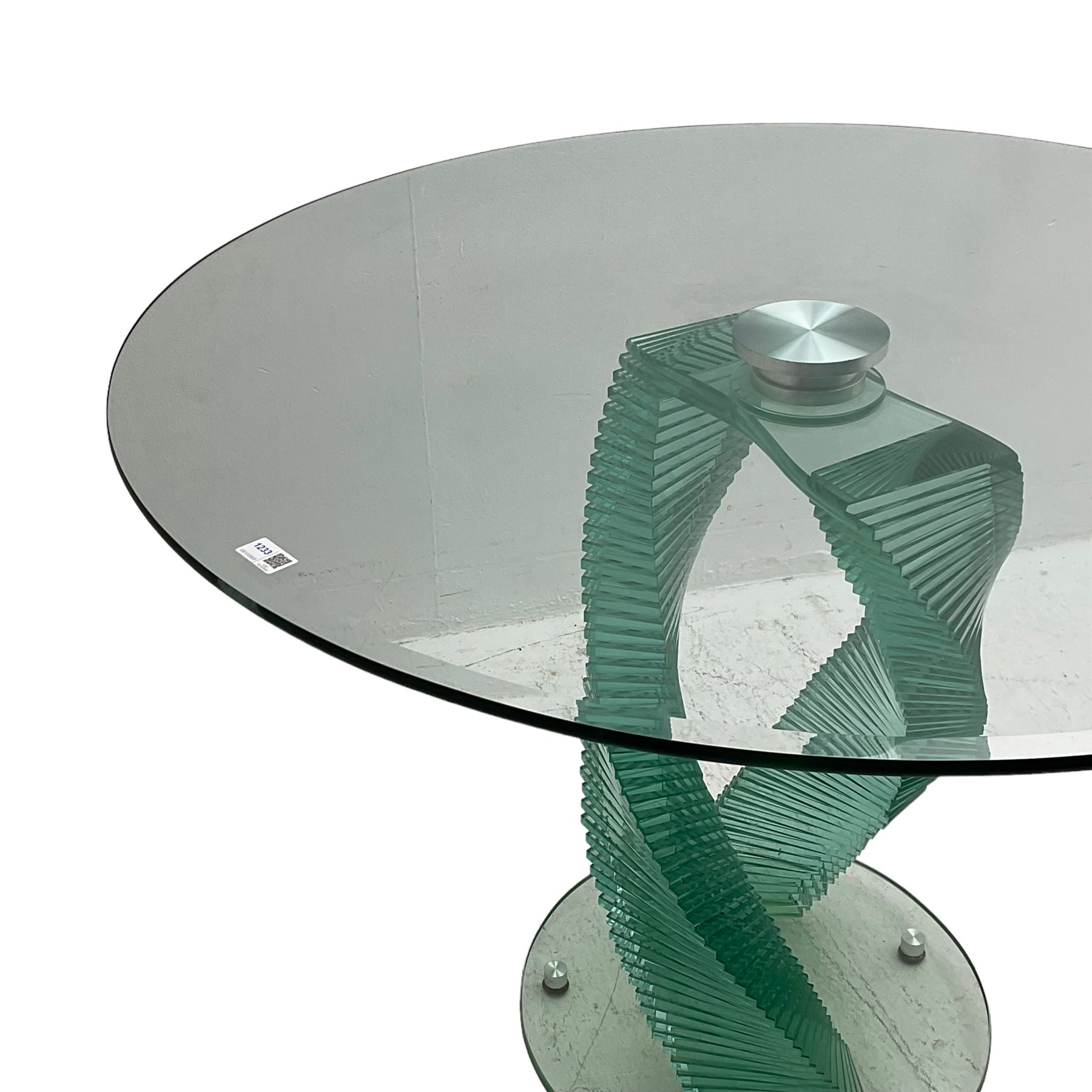 Contemporary sculptural glass table, on stacked twist base, bevelled circular top