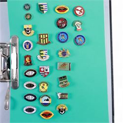 Amateur rugby league enamel badge collection, teams including Birmingham Bulldogs, Bridlington, Dudley Hill, Duke of York, Edinburgh Eagles, Guiseley, Rangers, Huntingdon, Keighley Town, Leigh Miners, Pilkington Recs, St Josephs, Thornhill Trojans, West London Sharks etc, all displayed in three folders and six amateur league badges from Leeds & District, Hull & District, York & District, Warrington, Lancashire County and Yorks County in box display, (approximately 270)