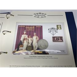 Coin covers and first day covers including, 2001 'Christmas' containing Isle of Man 2000 fifty pence, 2001 'Nobel Prize Centenary 1901-2001' containing 2001 two pounds, 2002 'Golden Jubilee 1952-2002' containing Bailiwick of Guernsey 2002 silver five pounds etc, housed in four ring binder folders
