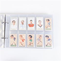 Collection of Edwardian and later Football related trading and cigarette cards, including forty-nine of fifty 1906 Ogden's Football Club Colours, 1922 PALS Footall series, ninety of one hundred 1925 Gallaher Famous Footballers, complete set of forty-four 1926 Ogden's Captains of Association Football Clubs and Colours, complete set of fifty 1927 Players Football Caricatures by MAC,  complete set of fifty 1927 Players Football Caricatures by RIP,  complete set of fifty 1930 Players Association Cup Winners, complete set of 50 1933 Ogdens AFC Nicknames etc, housed in brown cigarette card album