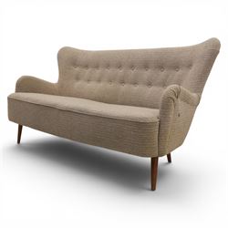 Ernest Race (British 1913-1964) - mid-20th century DA3 wingback settee upholstered in buttoned beige fabric