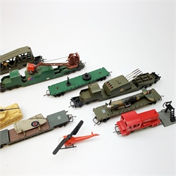 Tri-ang/Hornby '00' gauge - Battle Space North British 0-4-0 Diesel Shunter locomotive in red; Assault Tank Transporter; 4-Rocket Launcher; RAMC Ambulance car; Helicopter car; Tank Recovery car; Anti-Aircraft Searchlight wagon; two Plane Transporter cars; Plane Launching car; and two Exploding cars (one red) with instructions, all unboxed, (12)