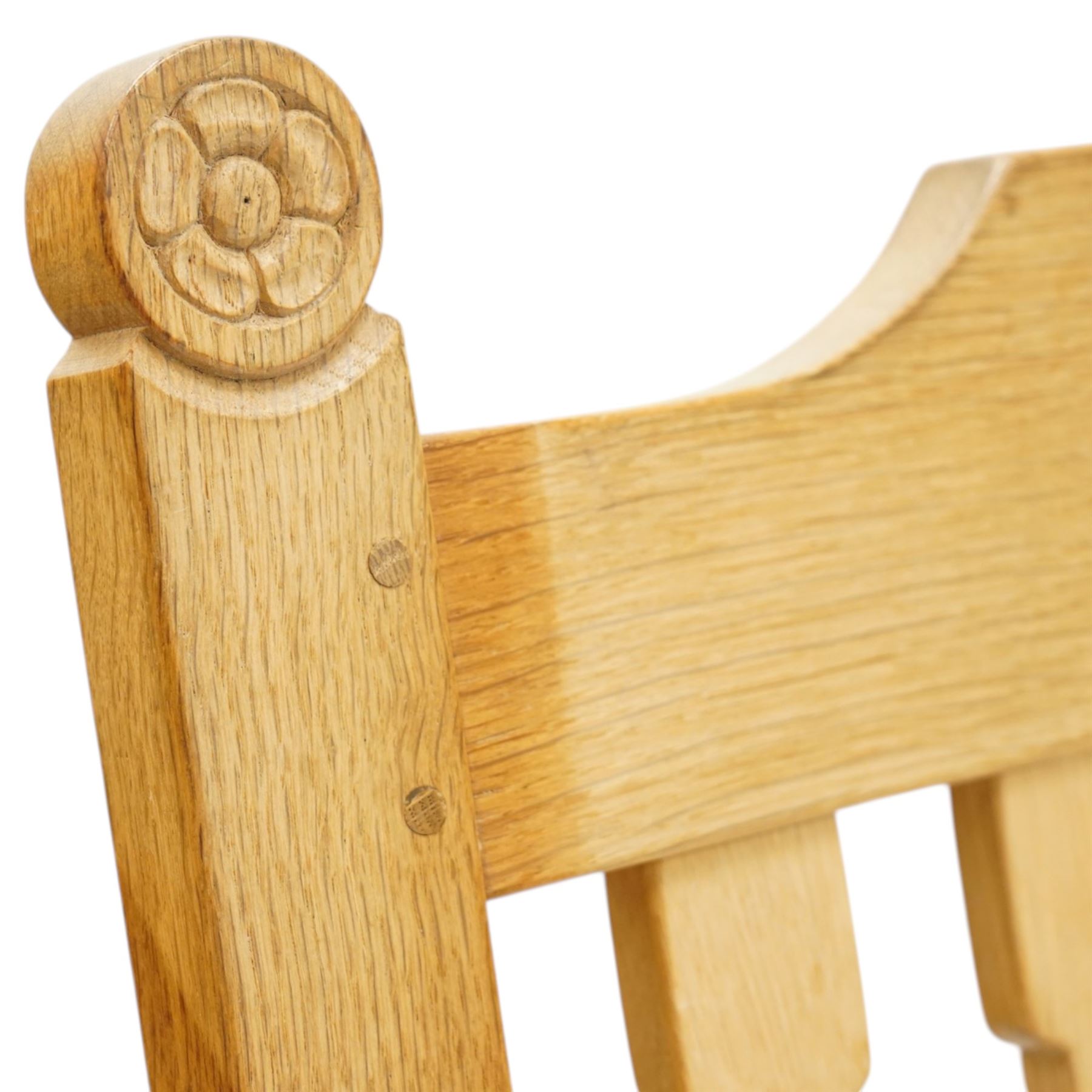 Beaverman - oak 'Ripley' rocking chair with shaped lathe backs and leather seat, with signature Beaver carving to the top rail, flanked by Yorkshire Roses, by Colin Almack of Sutton near Thirsk