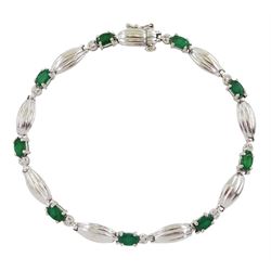 9ct white gold oval emerald and diamond link bracelet, hallmarked