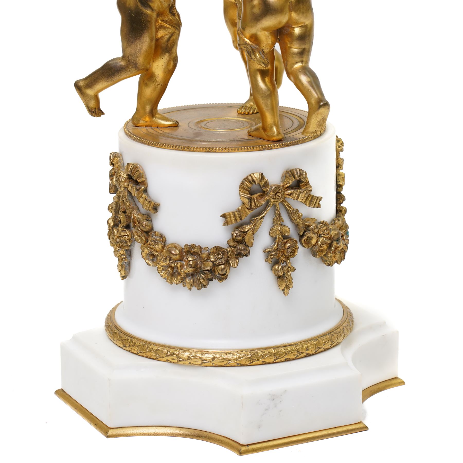 French- late 19th century 8-day globe clock, patinated globe with applied gilt Roman numerals, arrow-shaped hands and supported by three ormolu putti on a stepped columnar white marble base with a floral garland mount, twin train Parisian movement by Japy Freres with a recoil anchor escapement and countwheel strike, sounding the hours and half-hours on a bell. With pendulum.