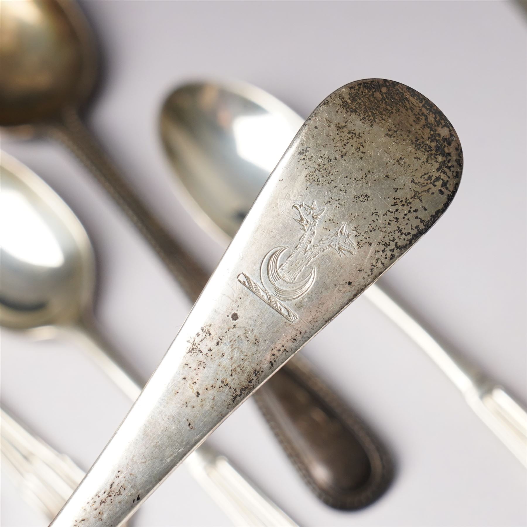 Quantity of assorted silver cutlery including sauce ladle, Victorian caddy spoon, various teaspoons, golf club spoons etc