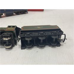 Hornby/Tri-Ang ‘00’ gauge - nine locomotives to include Britannia Class ‘Britannia’ 4-6-2 no.70000 in BR green; Class M7 4-4-0 Tank no.30027 in BR black; Princess Class ‘Princess Victoria’ 4-6-2 no.46205 in BR black; in original boxes; further loose models Princess Class ‘Princess Elizabeth’ 4-6-2 no.46201 in BR green; Class 3F 0-6-0 tank no.7606 in LMS crimson; TR double ended diesel locomotive; three further tank locomotives and one loose tender (10) 