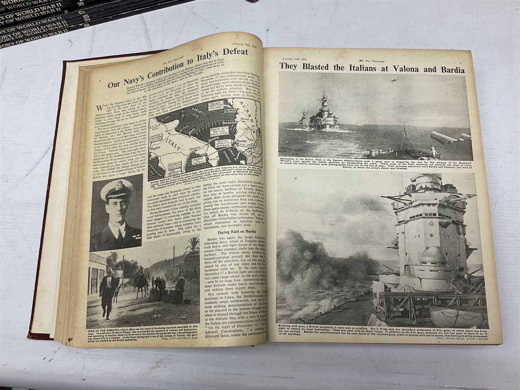 Three boxes of books, periodicals and DVDs of military interest with particular emphasis on WW2 including The History of World War Two in thirty original parts by Orbis, The D-Day Experience by Richard Holmes, The World War Two Databook, The World at War, Special Forces etc
