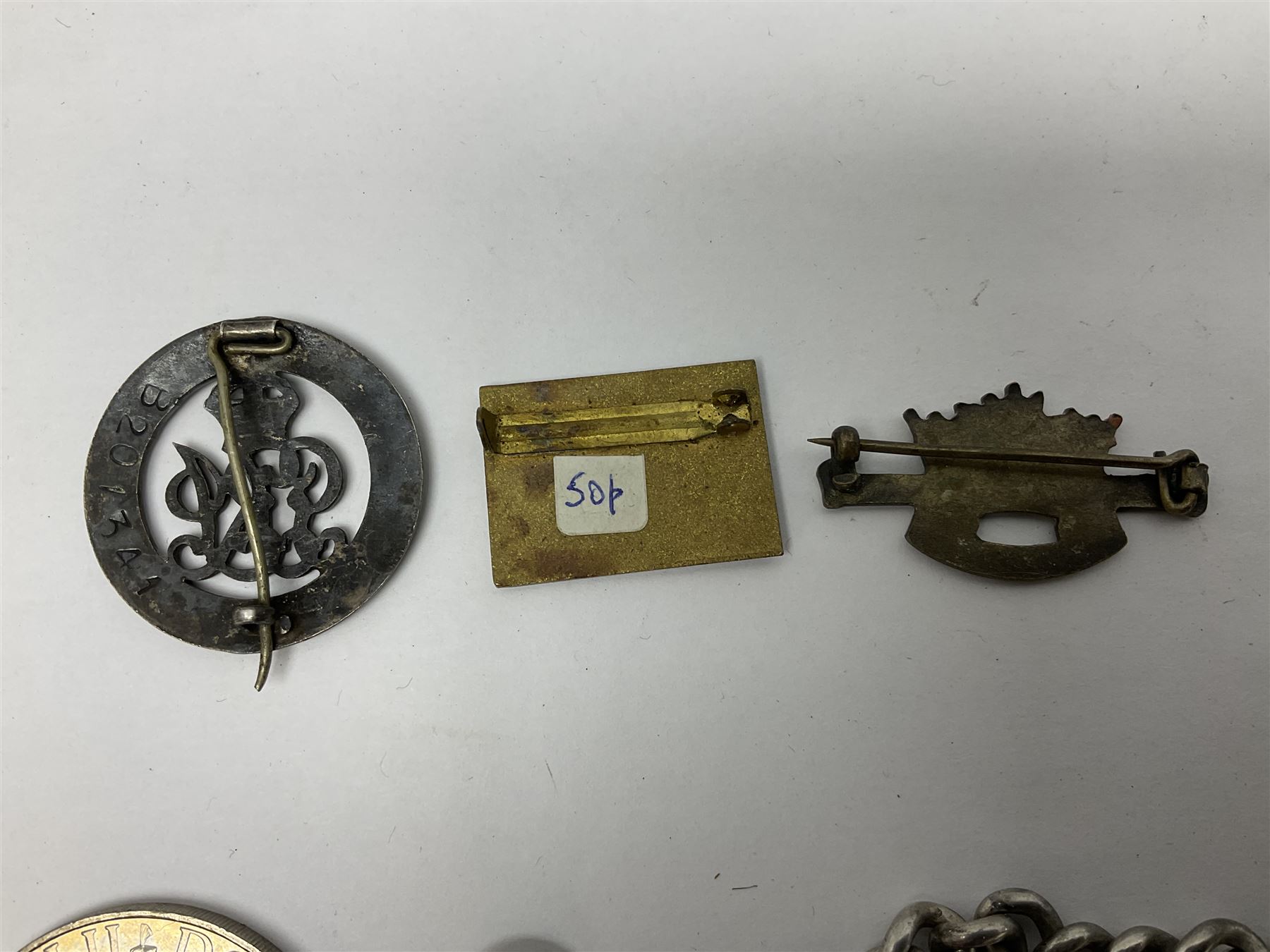 Two Services Rendered badges Nos.B23060 and B201341; two MSO BAOR (Mixed Services Organisation British Army of the Rhine) badges; small quantity of shoulder titles, lapel/sweetheart brooches, buttons and non-military related items