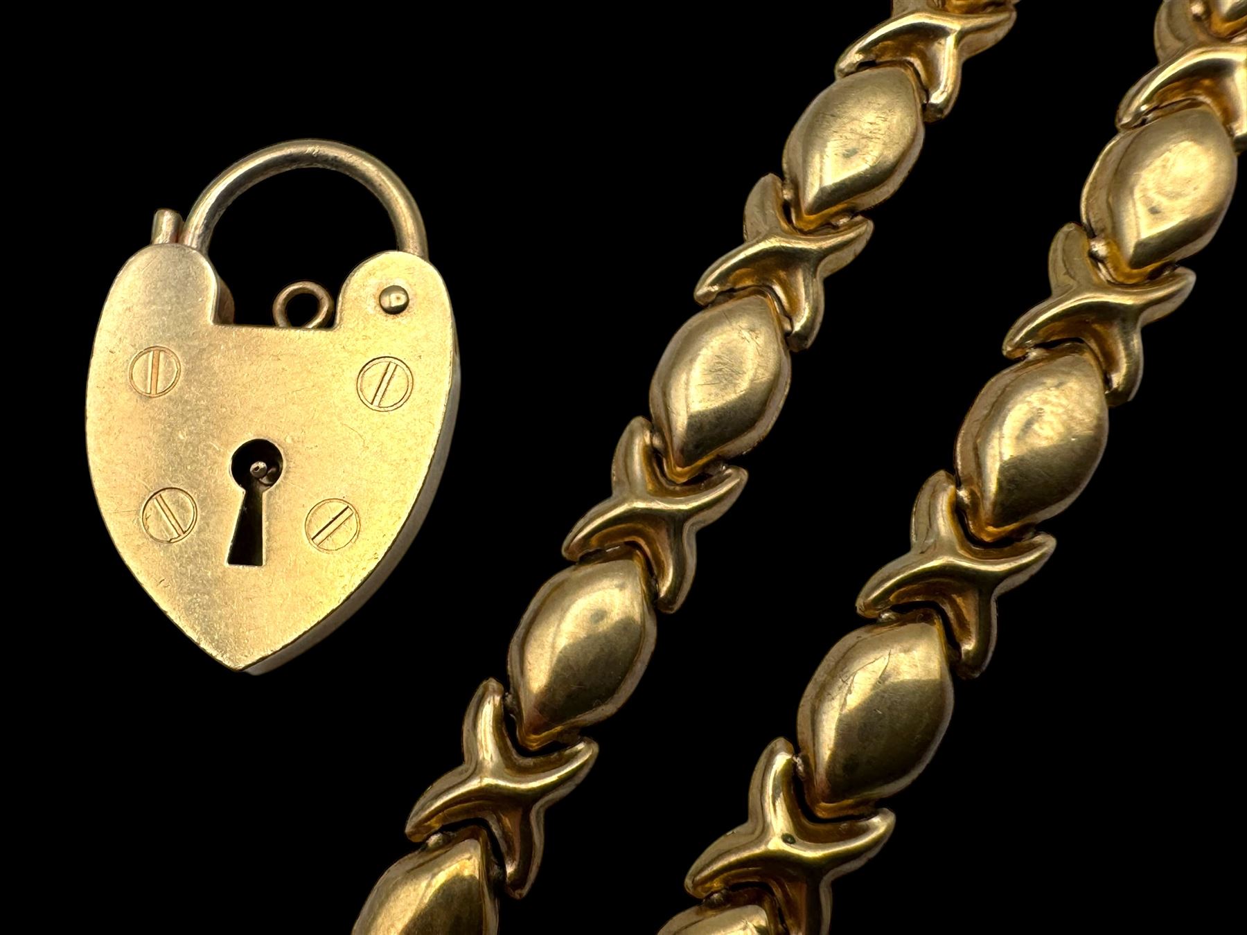 9ct gold jewellery, comprising bracelet links and a heart padlock clasp, both hallmarked 