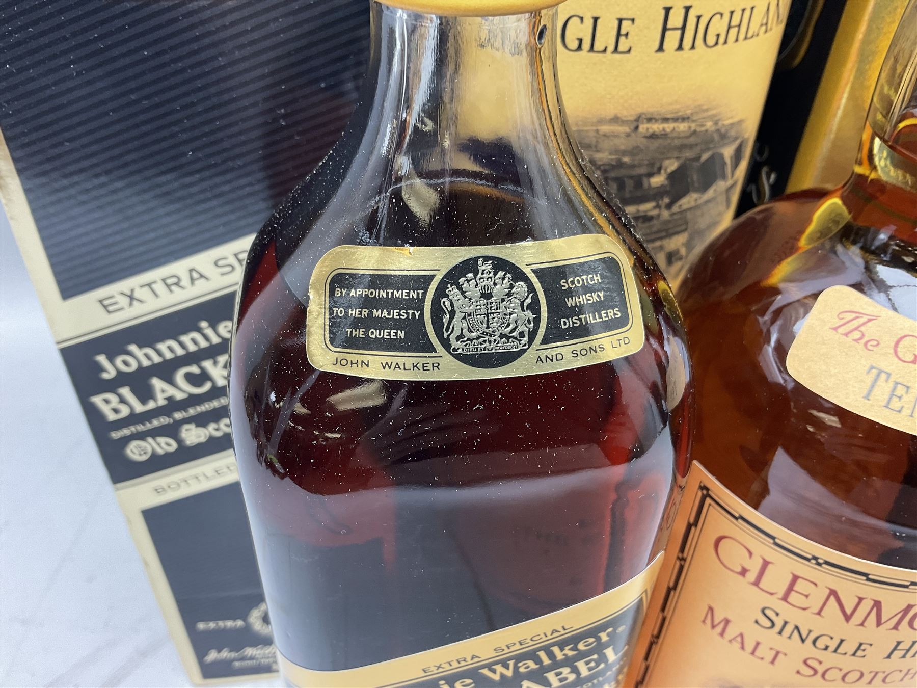 Glenmorangie, ten year old Scotch whisky, 1 litre 43% vol, Grant's twelve year old Scotch whisky 1 litre, 43 G.L and Johnnie Walker Black Label, twelve year old Scotch whisky, 1 litre 43% vol, all boxed (3)