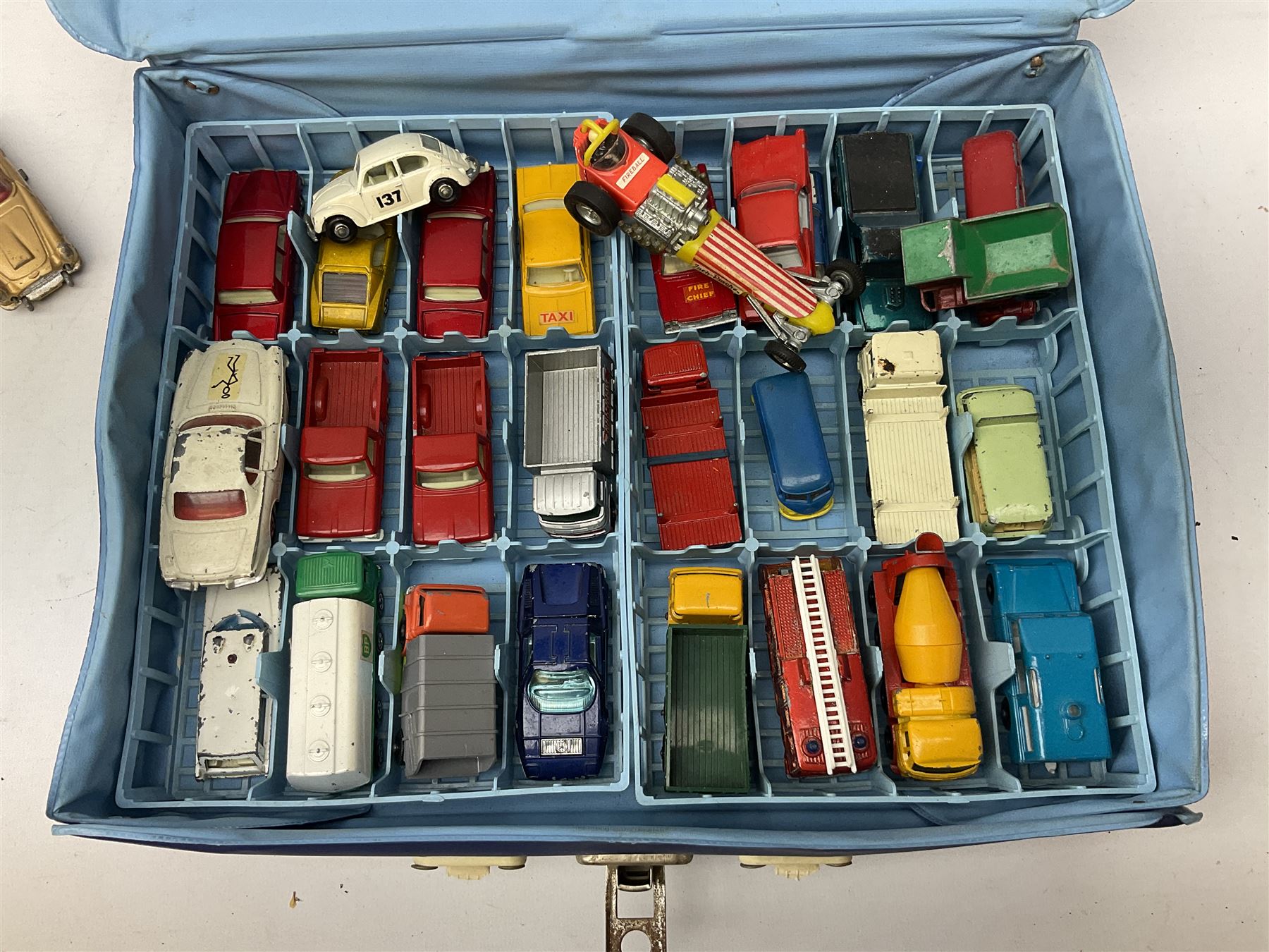 Unboxed and playworn die-cast models of TV/Film interest by Corgi including Green Hornets Black Beauty, two Batmobiles, James Bond Aston Martin DB5, Saints Volvo P1800 etc; two Matchbox 1-75 Series Collector's Cases including various playworn models; and quantity of playworn lead and plastic figures by Britains etc