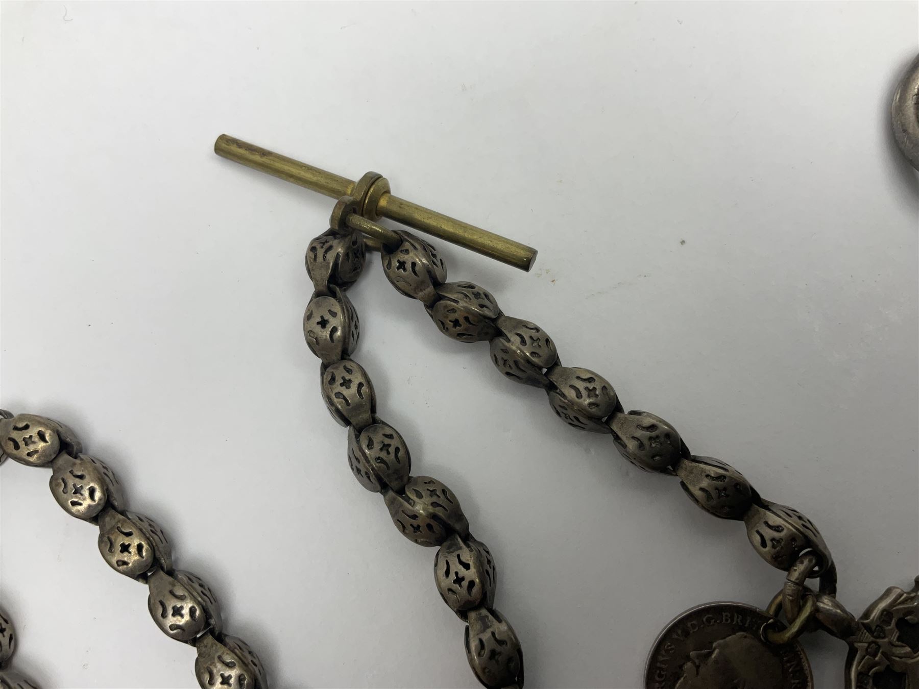 Victorian silver open face fusee lever pocket watch by D A Olswang, Sunderland, No. 7904, white enamel dial with Roman numerals and subsidiary seconds dial, case hallmarked Chester 1895 and a watch chain with silver fob and coin

 

