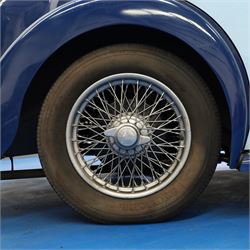 1939 MG SA Saloon

Registration: GRB 988
Chassis number: SA2983
Engine number: QPHG3242 (original engine)
Engine: 2,322cc six-cylinder petrol
Transmission: Manual
Odometer reading: 71,873 miles
Seating: Five
Colour: Two-tone blue
Former keepers: 6/7 recorded
V5C: Present
Keys: One

A 1939 MG SA Saloon, finished in an attractive two-tone blue colour scheme and retaining its original UK registration, GRB 988.

Introduced in 1936, the MG SA was the marque's prestigious sporting saloon, combining elegant coachwork with refined six-cylinder performance and luxurious accommodation. This example retains its original 2,322cc engine, numbered QPHG3242, and displays 71,873 miles on the odometer, although this mileage has not been independently verified.

The car is understood to have undergone an extensive rebuild and restoration between 2010 and 2015 and is today presented in showroom condition throughout. The coachwork has an excellent finish, complemented by outstanding chrome brightwork, wire wheels, a rear-mounted spare wheel, folding rear luggage rack and a desirable folding canvas sunroof. The engine bay is immaculately detailed, while the underside, chassis and suspension all reflect the high standard of restoration undertaken. A stainless-steel exhaust system has also been fitted.

The luxurious cabin features beautifully finished inlaid wood veneer, leather seating and period instrumentation, all presenting to an exceptionally high standard.

A particularly appealing aspect of this MG SA is its documented participation in the 1952 Daily Express National Motor Rally. Accompanying the vehicle are the original official rally programme together with period photographs showing the car competing in the event displaying entrant number 36. The programme lists entrant No. 36 in Class D.2 as an MG 2322cc, providing excellent documented provenance linking this car to one of Britain's best-known post-war motoring events, held between 12th and 15th November 1952.

Combining documented provenance with exceptional cosmetic presentation, this MG SA represents a rare opportunity to acquire one of MG's flagship pre-war sporting saloons.

At the time of cataloguing the vehicle started and ran well.

Features

• Original 2,322cc six-cylinder engine
• Manual transmission
• Original UK registration
• Two-tone blue coachwork
• Folding canvas sunroof
• Leather interior
• Inlaid wood veneer dashboard and trim
• Wire wheels
• Rear-mounted spare wheel
• Folding rear luggage rack
• Twin carburettors
• Stainless-steel exhaust system
• Extensive rebuild and restoration completed between 2010 and 2015

History and Documentation

• Approximately six to seven former keepers recorded
• Original engine (No. QPHG3242)
• Chassis No. SA2983
• Original UK registration
• Extensive rebuild and restoration completed between 2010 and 2015
• Original 1952 Daily Express National Motor Rally programme
• Period photographs showing the vehicle competing as Entrant No. 36
• V5C registration document not present
• One key

Condition

Presented in exceptional showroom condition, this MG SA has clearly benefited from a high-quality restoration completed to an impressive standard. The paintwork, chrome, interior, engine compartment and underside are all exceptionally well presented, reflecting the considerable work undertaken.

The vehicle started and ran well at the time of cataloguing. It has not been subjected to a full mechanical inspection by the auctioneers, and prospective purchasers should satisfy themselves as to the vehicle's condition, originality, mileage, specification and roadworthiness prior to bidding.

This vehicle forms part of the Estate of the late John Sills and is offered for sale by the Executors, providing a genuine reason for sale.