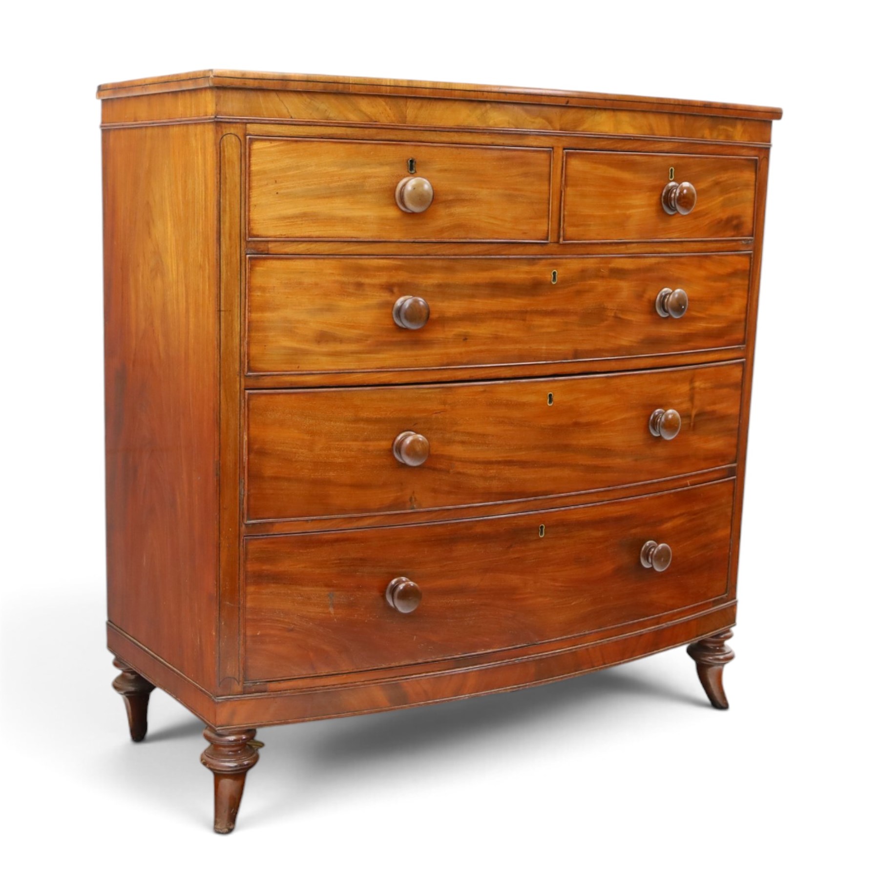 19th century mahogany bow-front chest, shaped top with ebony strung edge over banded frieze, fitted with two short over three long cock-beaded drawers, on turned feet