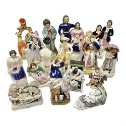 Collection of Victorian and later Staffordshire style figures, to include Prince Albert, the royal children, spilt vases etc, together with Victorian fairings