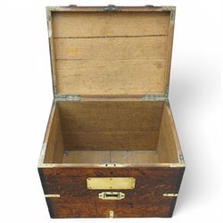19th century oak and metal bound box, hinged lid enclosing vacant interior, bound with wrought metal straps and fitted with brass corner caps, two heavy weight brass carrying handles 