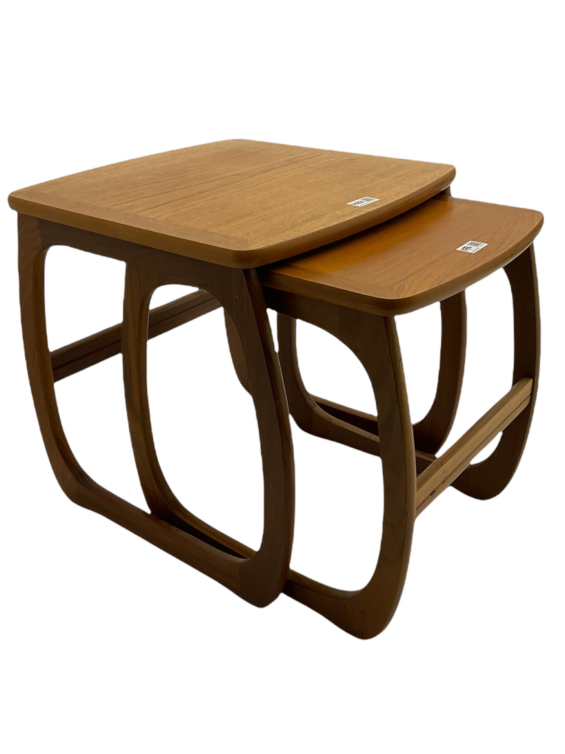 Nathan - teak Long John nest of tables and a singular nest of tables 