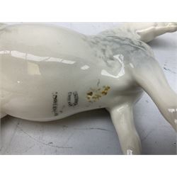 Seven Beswick figures of horses, including Connemara pony in grey no.1641, Arab in bay no.1265, large foal in grey no.947 etc, together with a Goebel figure of a horse (8)