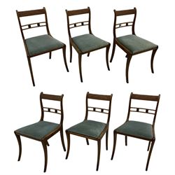 Set of six Regency period mahogany dining chairs, drop in seats with sabre legs