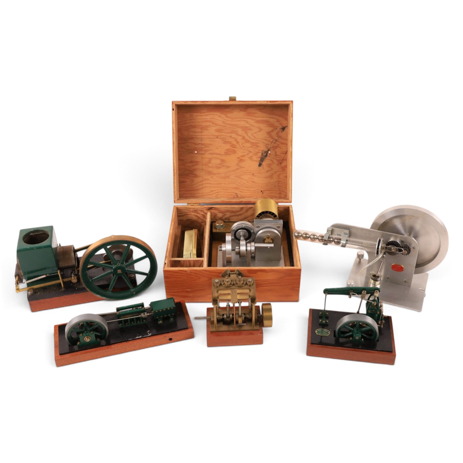 Collection of kit built model engines, including a Stirling Engine and vacuum engines, all with makers plaques for Hanby Malton