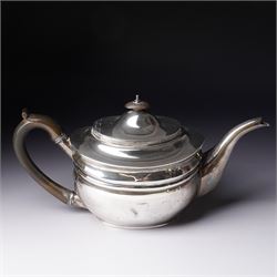 Silver three piece tea set of oval form, the teapot with ebonised handle and lift London 1913 Maker John Hunt and a pair of Victorian silver sugar tongs