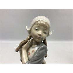Three Lladro figures, comprising Dutch Girl with Braids no 5063, Dutch Girl with Duck no 5066 and Aracely with Ducks, all with original boxes, largest example H25cm
