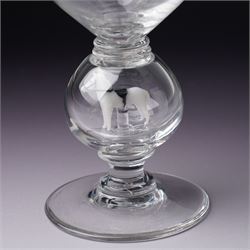Set of six 1930s glass goblets by William Swingewood for Stevens & Williams, each goblet with lampwork glass stem, the large hollow blown knop containing dog, pair of hounds, horse, raven and two with flowers, H18cm (6)