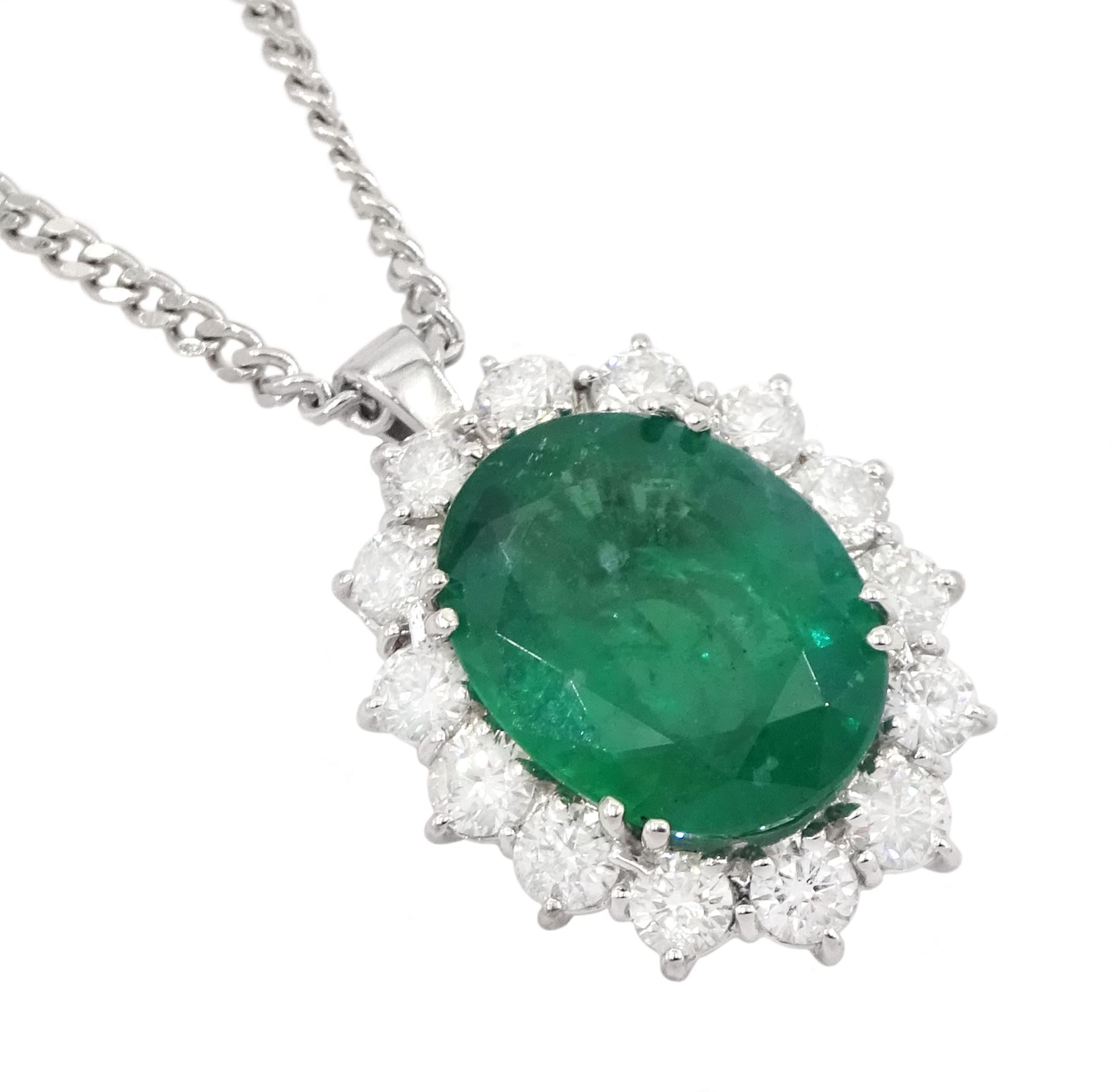 18ct white gold oval cut emerald and round brilliant cut diamond, cluster pendant necklace, hallmarked, emerald approx 4.00 carat
