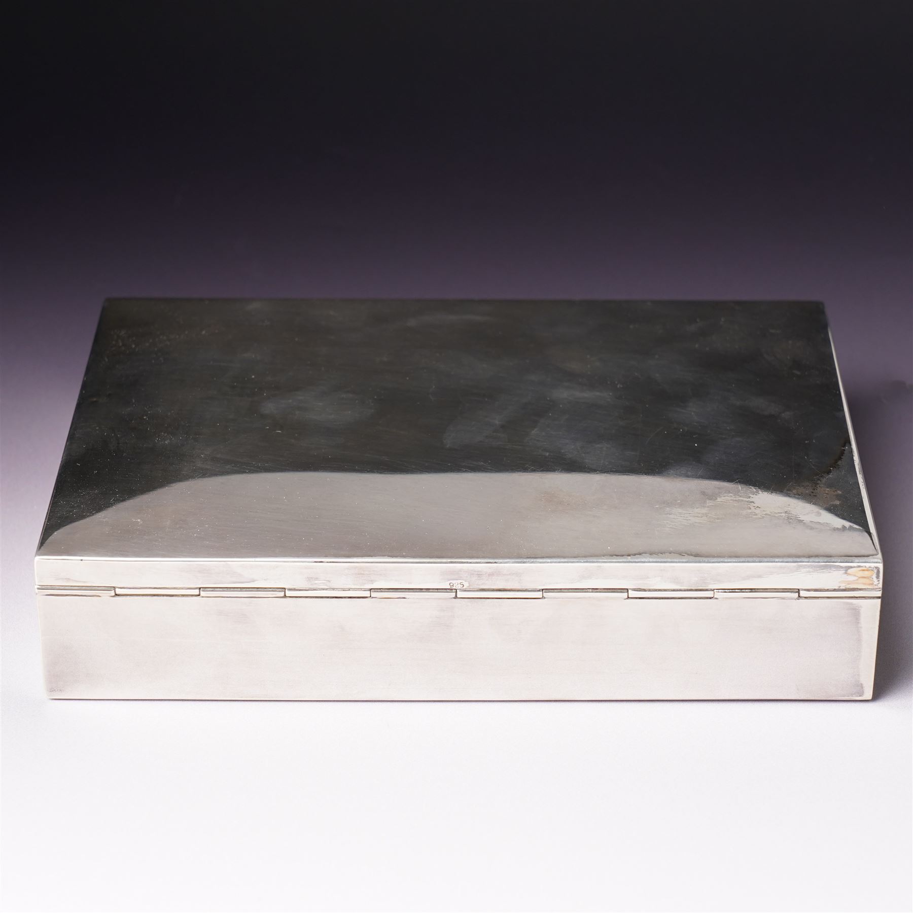 German 925 standard silver cigarette box with hinged lid  and a silver bottle coaster with turned wood base London 1986 Maker M C Hersey & Son