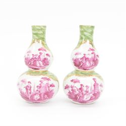 Pair of small late 19th century German double gourd vases, probably Dresden, each hand painted in puce with reserves of a courting couple within a garden setting, and floral sprays upon a white ground, within a green painterly surround, each with very faint traces of blue marks to the unglazed base, H12.5cm