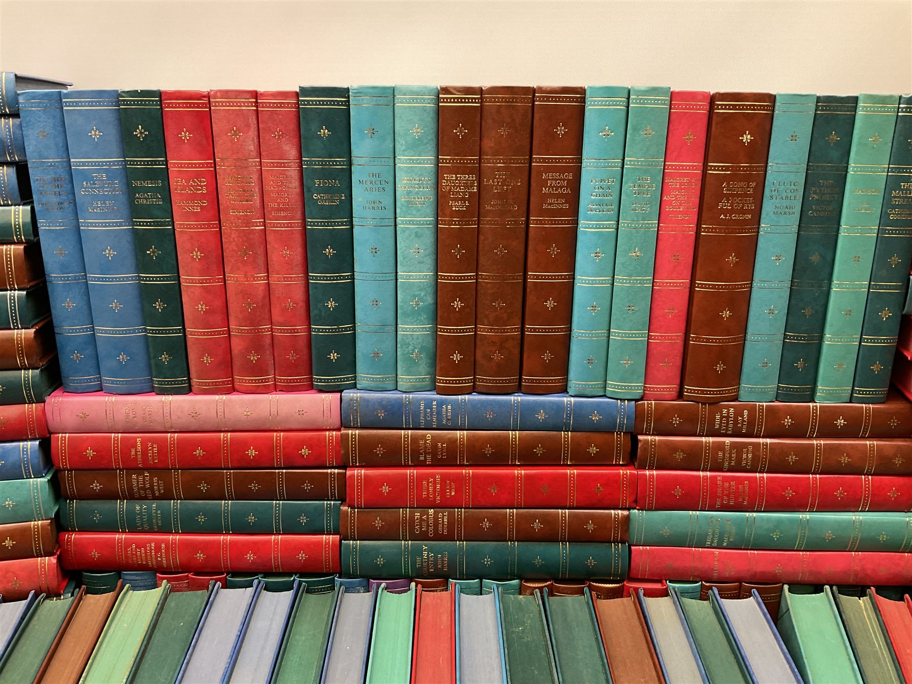 The Companion Book Club London, approximately one hundred thirty hardback novels, various titles including, Blood Sport by Dick Francis, Nemesis by Agatha Christie, The Eye of The Tiger by Wilbur Smith, etc. 