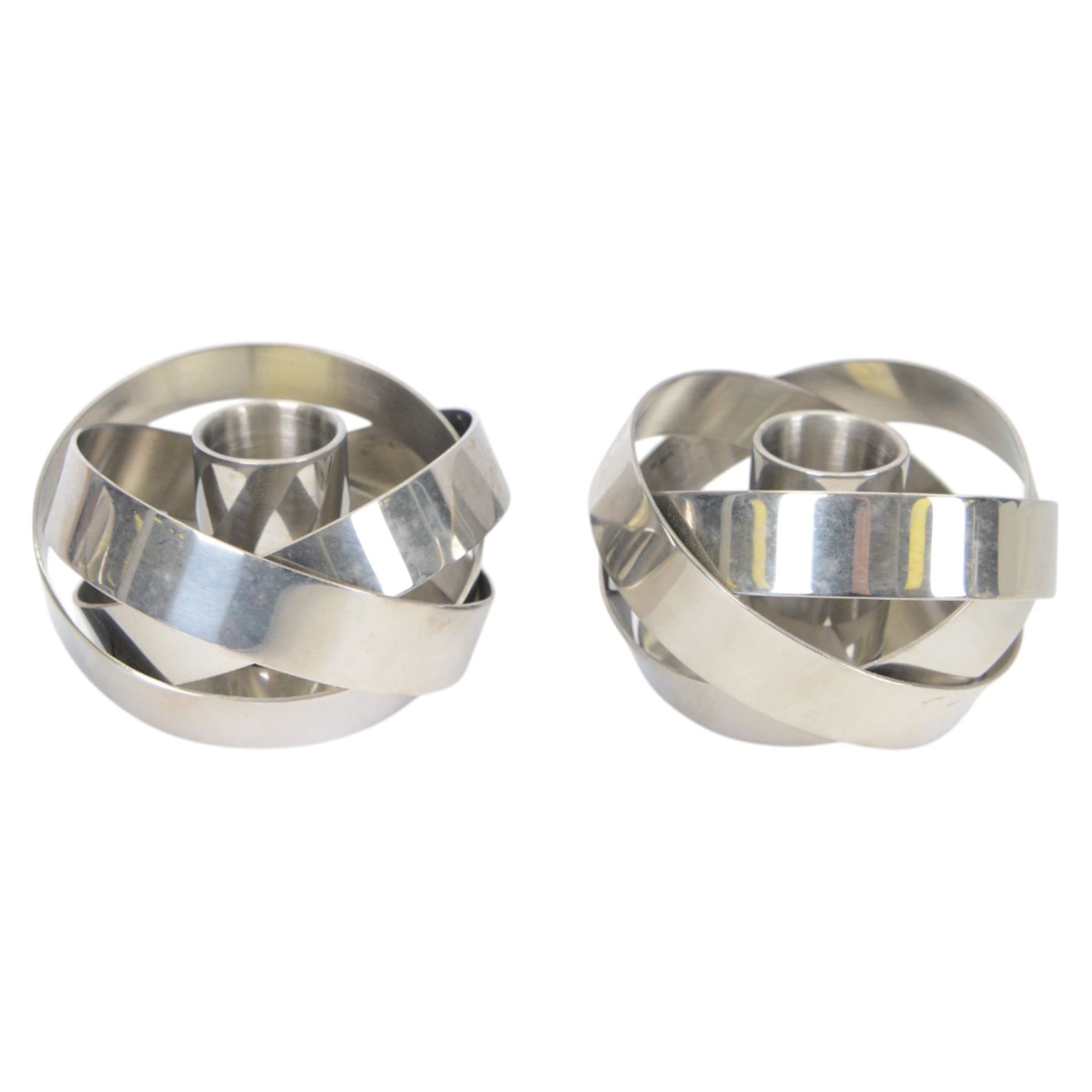 Pair of Georg Jensen stainless steel candleholders and matching pair of tealight holders, both designed by Alken & Bengtsson, with original boxes 