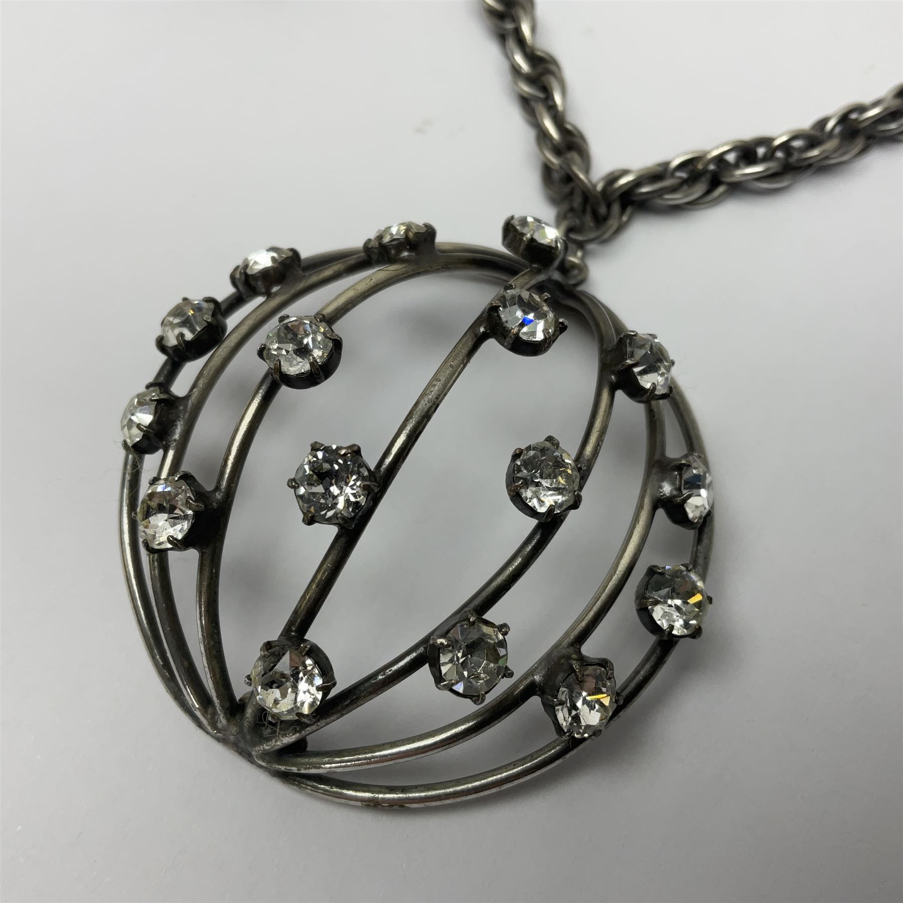 Joseff of Hollywood, circa 1950s metal and white paste necklace, with three graduated pendant drops set with white paste, to a Prince of Wales chain, signed with round script tag