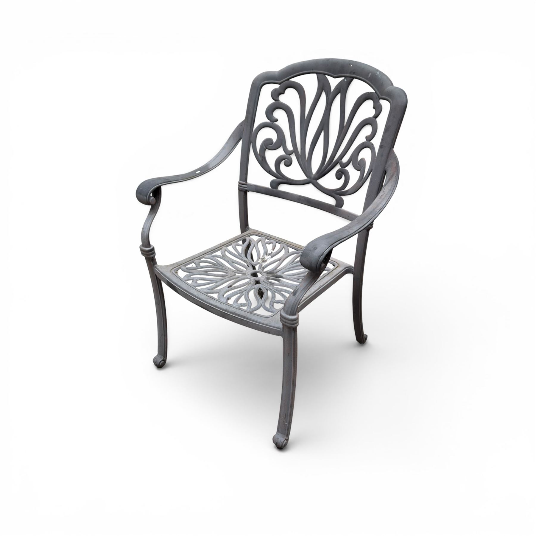 Circular aluminium garden table and pair of armchairs chairs with a pierced and scrolling backs 