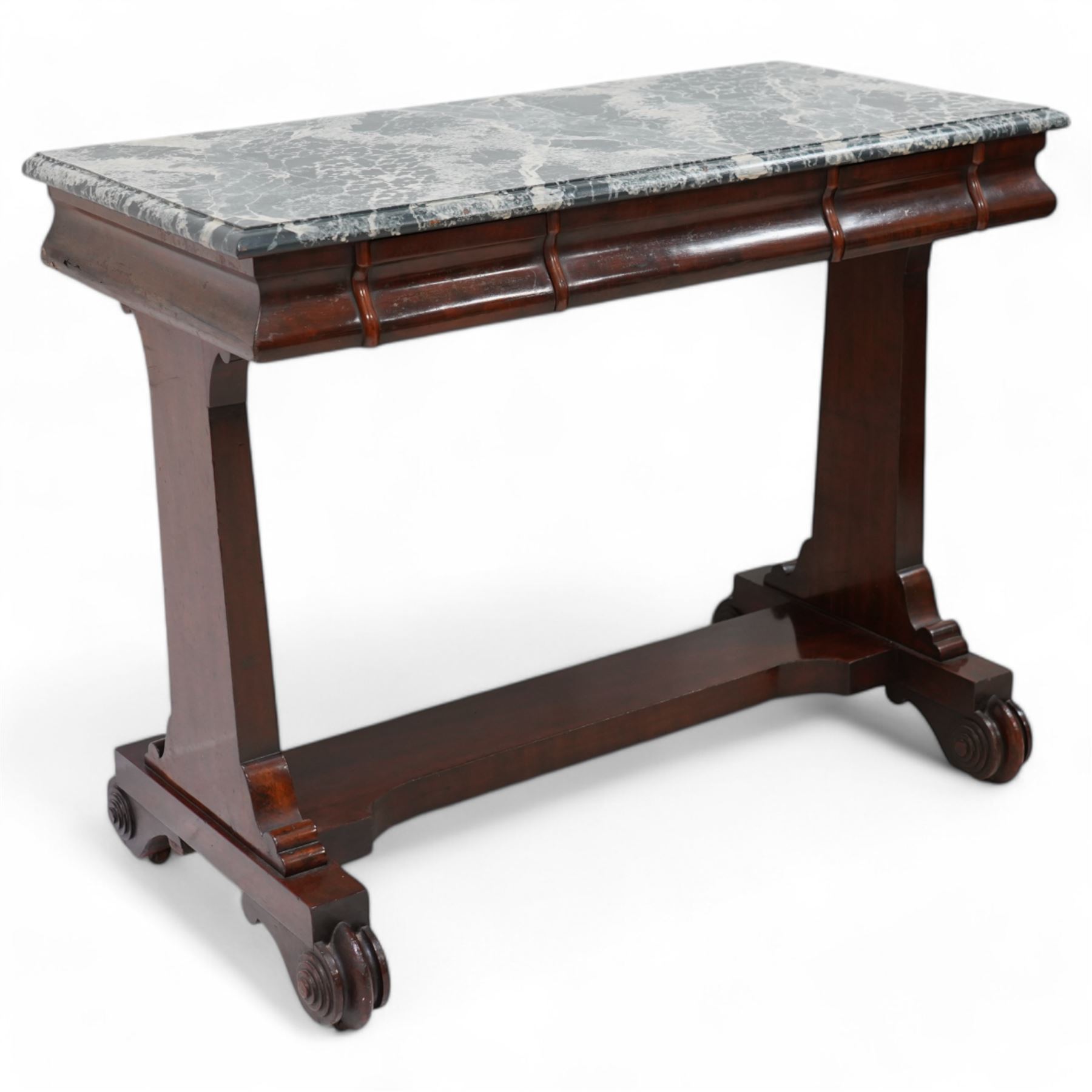 19th century mahogany side table, moulded rectangular top with simulated marble finish, ogee moulded frieze fitted with two drawers, rectangular and supports on scroll carved feet united by flat stretcher 