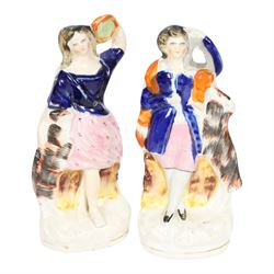 Six 19th century Staffordshire Theatre figures, comprising rare example of Jules Perrot as Diavolino, Jules Perrot as Albrecht, Carlotta Grisi as Esmeralda, Carlotta Grisi as Esmeralda and Jules Perrot as Gringoire, and further pair, tallest example H24.5cm


