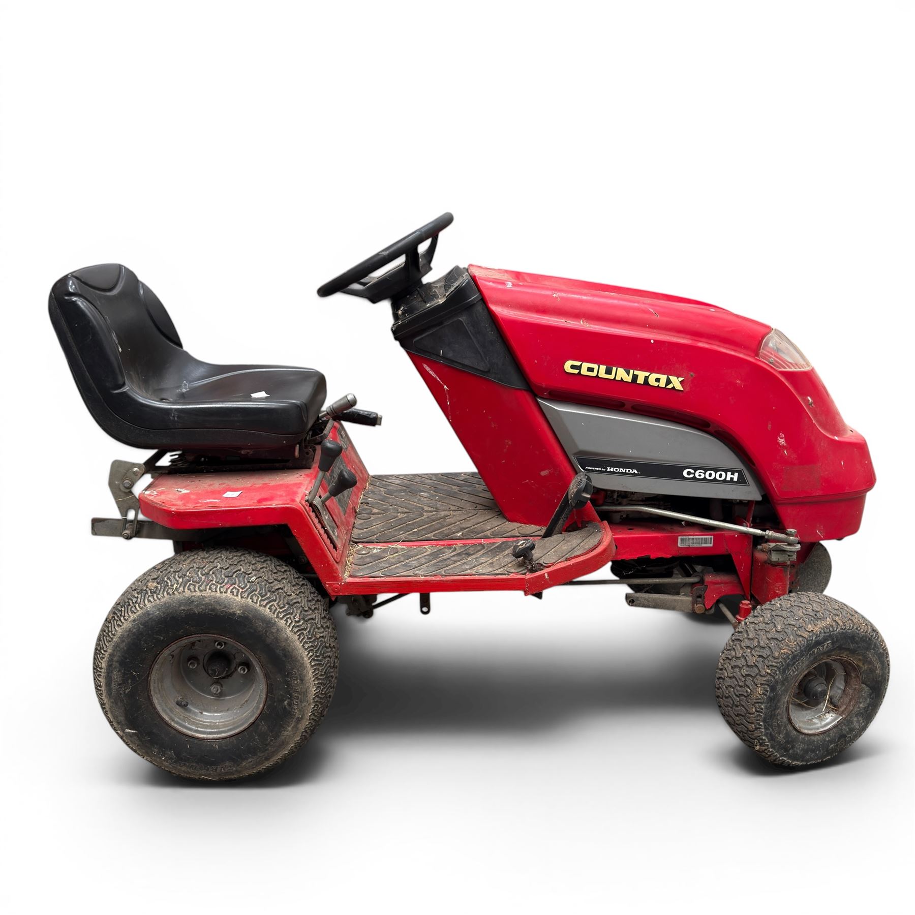Countax C600H - ride on lawnmower / yard tractor with Honda engine, black seat and red bodywork.