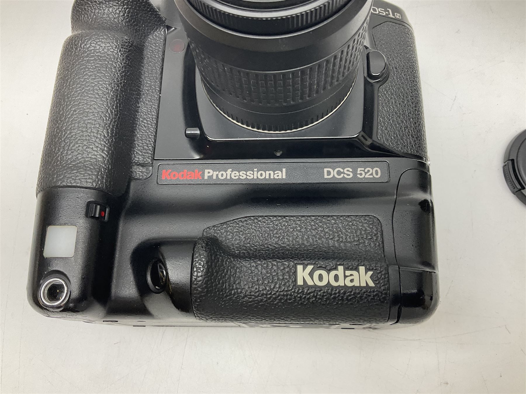 Canon EOS 1n Digital camera body, serial no. 260436, with 'Canon Zoom Lens EF 35-80mm 1:4-5.6 II Canon Inc. 52mm' lens, Kodak Professional DCS 520 digital module, and charger, serial no. K520C03165, together with Nikon F5 camera body with Kodak Professional DCS 760 digital module and charger, serial no. K760C03802