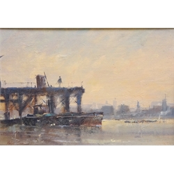  Peter Gilman (British 1928-1984): City River Scene, oil on board signed 16cm x 23.5cm  