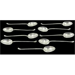 Mid 20th century silver matched set of nine teaspoons, the handles modelled in the form of golf clubs, hallmarked Sheffield and London, dates ranging 1947-1963, various makers marks, approximate total weight 3.44 ozt (107 grams)